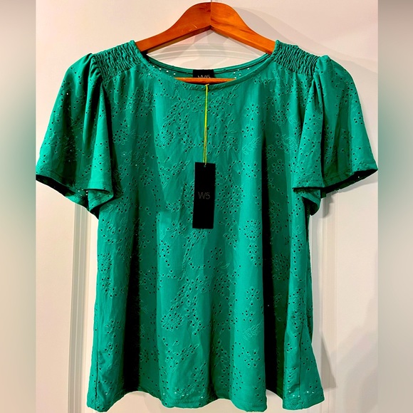 Short sleeved eyelet blouse. Polyester/spandex. Kelly green color. - Picture 1 of 5